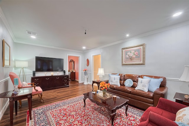 7833 Narcissus St, Houston, TX 77012 - living area with dark wood-style floors, crown molding, and recessed lighting