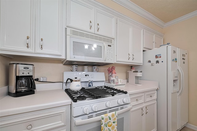 7833 Narcissus St, Houston, TX 77012 - kitchen featuring white appliances, ornamental molding, white cabinetry, and light countertops