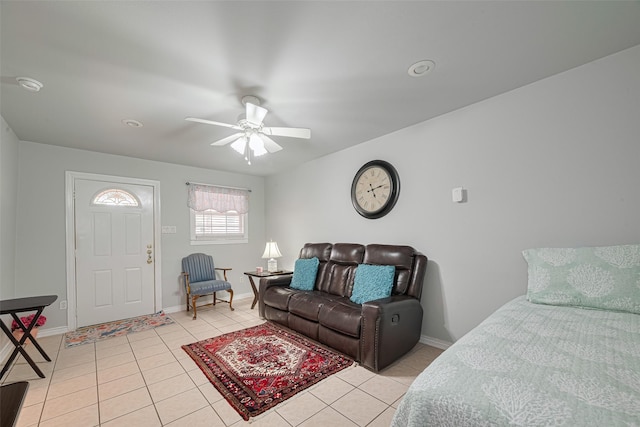 7833 Narcissus St, Houston, TX 77012 - bedroom featuring light tile patterned flooring and a ceiling fan