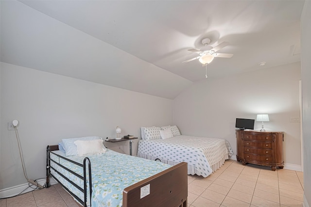 7833 Narcissus St, Houston, TX 77012 - bedroom with light tile patterned floors, lofted ceiling, and a ceiling fan