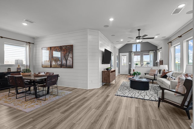10502 William Park Dr, Missouri City, TX 77459 - living area featuring ceiling fan, light wood-style floors, vaulted ceiling, and recessed lighting