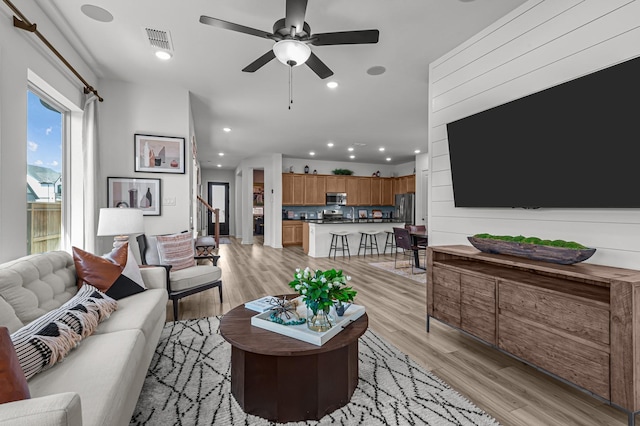10502 William Park Dr, Missouri City, TX 77459 - living room featuring a ceiling fan, light wood-type flooring, and recessed lighting