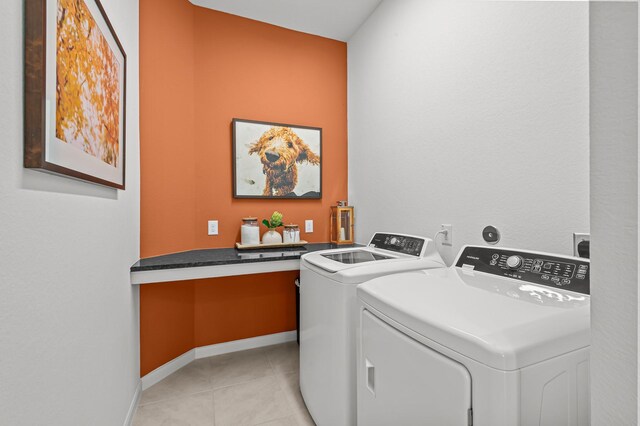 10502 William Park Dr, Missouri City, TX 77459 - washroom featuring separate washer and dryer and light tile patterned flooring