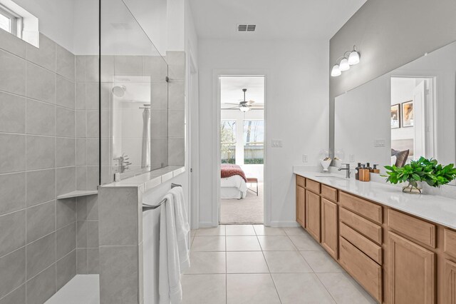 10502 William Park Dr, Missouri City, TX 77459 - ensuite bathroom with double vanity, walk in shower, tile patterned flooring, a ceiling fan, and a water view