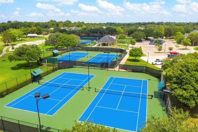 10502 William Park Dr, Missouri City, TX 77459 - view of tennis court with view of scattered trees