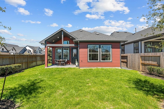 10502 William Park Dr, Missouri City, TX 77459 - rear view of house with a fenced backyard, a patio area, and roof with shingles