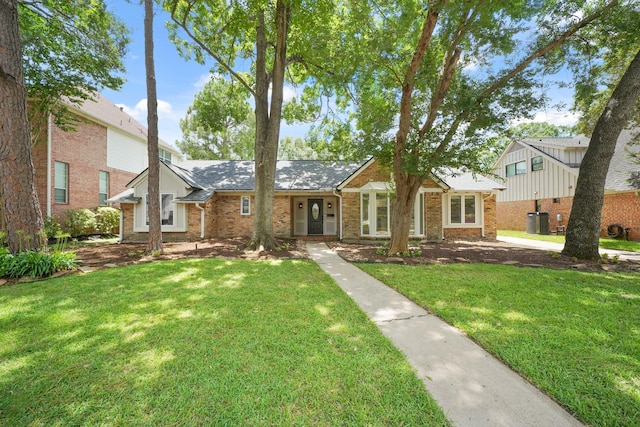 5135 Loch Lomond Dr, Houston, TX 77096 - view of front of home with a front lawn and brick siding