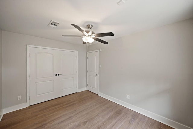 5135 Loch Lomond Dr, Houston, TX 77096 - unfurnished bedroom with wood finished floors and a ceiling fan