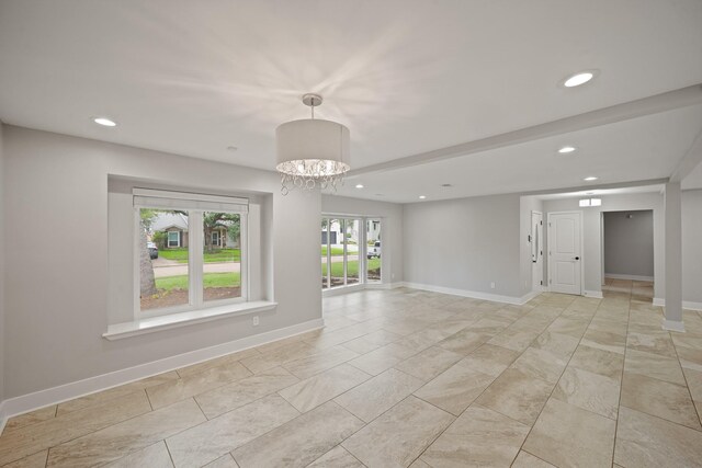 5135 Loch Lomond Dr, Houston, TX 77096 - empty room with recessed lighting, a chandelier, and light marble finish flooring