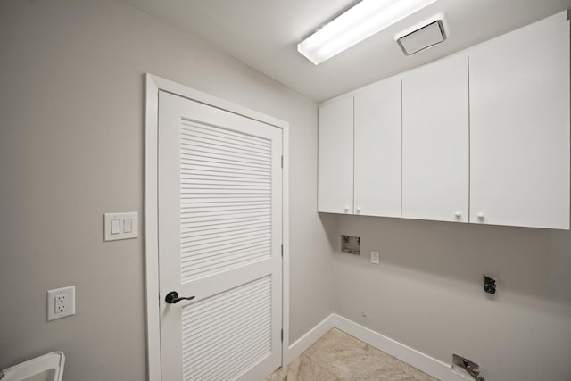 5135 Loch Lomond Dr, Houston, TX 77096 - laundry room with cabinet space, electric dryer hookup, and hookup for a washing machine