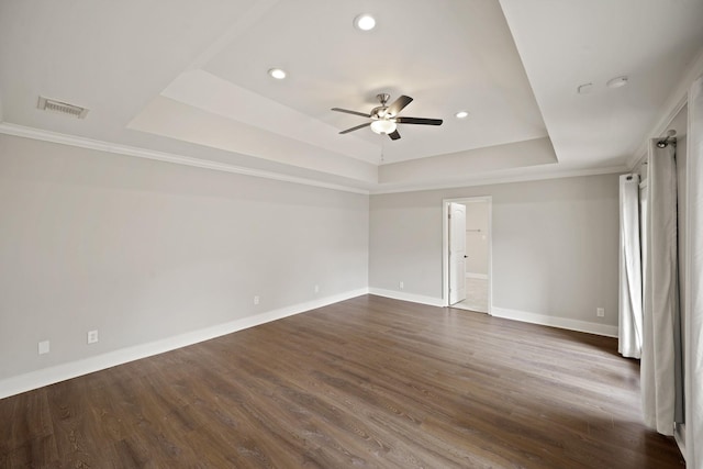 5135 Loch Lomond Dr, Houston, TX 77096 - spare room with a raised ceiling, a ceiling fan, dark wood finished floors, recessed lighting, and a smoke detector