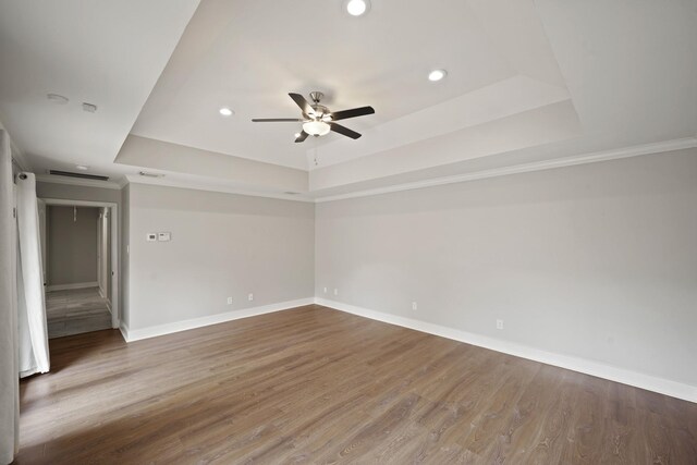 5135 Loch Lomond Dr, Houston, TX 77096 - spare room with a raised ceiling, ceiling fan, wood finished floors, recessed lighting, and attic access