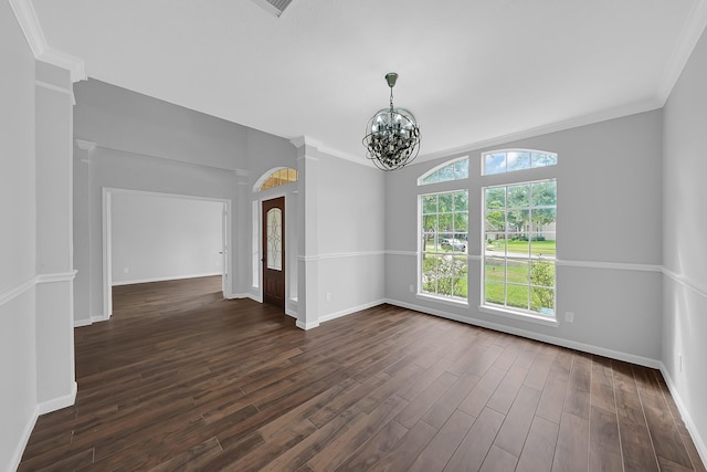 13810 Lakewood Crossing Blvd, Houston, TX 77070 - spare room with a chandelier, dark wood-style flooring, and ornamental molding