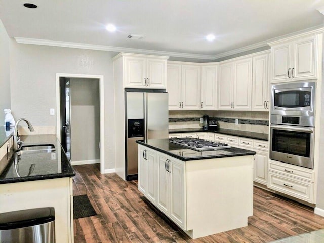 13810 Lakewood Crossing Blvd, Houston, TX 77070 - kitchen featuring stainless steel appliances, crown molding, dark wood-style floors, a center island, and white cabinetry