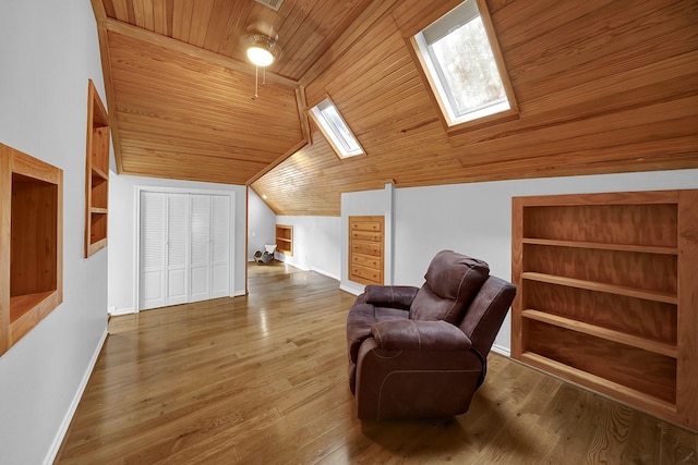 13810 Lakewood Crossing Blvd, Houston, TX 77070 - living area with a skylight, wood ceiling, lofted ceiling, and wood finished floors