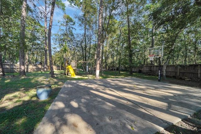 13810 Lakewood Crossing Blvd, Houston, TX 77070 - view of patio / terrace featuring a playground and basketball court