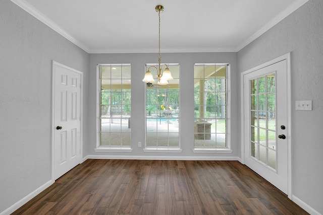13810 Lakewood Crossing Blvd, Houston, TX 77070 - unfurnished dining area featuring a chandelier, crown molding, dark wood-type flooring, and a textured wall