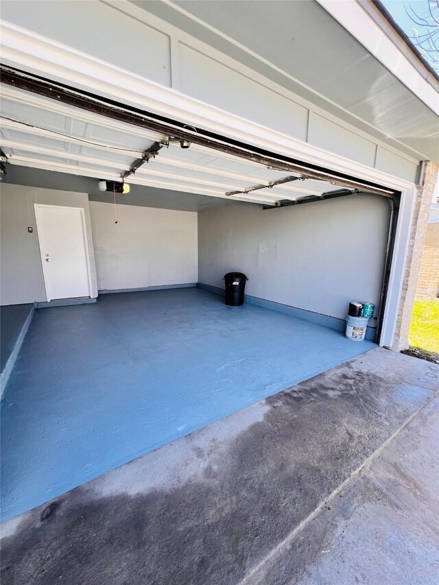 14634 Edenglen Dr, Houston, TX 77049 - garage featuring a garage door opener