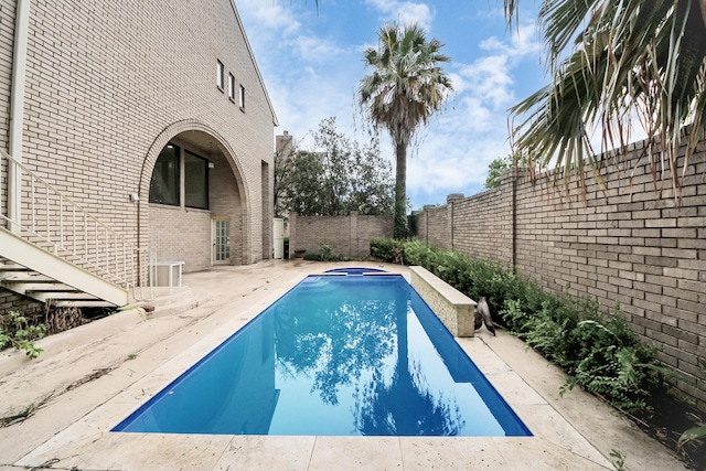 1425 Nantucket Dr Unit G, Houston, TX 77057 - view of pool with a fenced backyard and a patio area