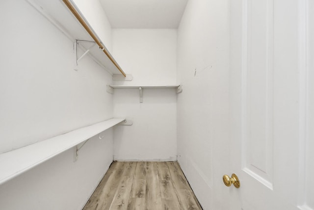 1425 Nantucket Dr Unit G, Houston, TX 77057 - spacious closet featuring light wood-type flooring