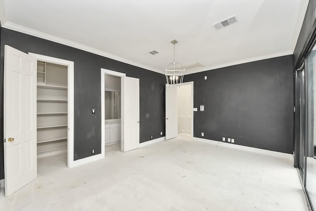 1425 Nantucket Dr Unit G, Houston, TX 77057 - unfurnished bedroom with ornamental molding, a spacious closet, a closet, and connected bathroom