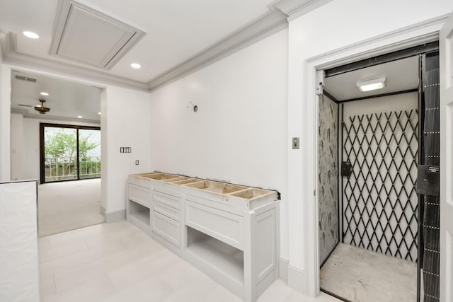 1425 Nantucket Dr Unit G, Houston, TX 77057 - mudroom featuring elevator, crown molding, recessed lighting, and attic access