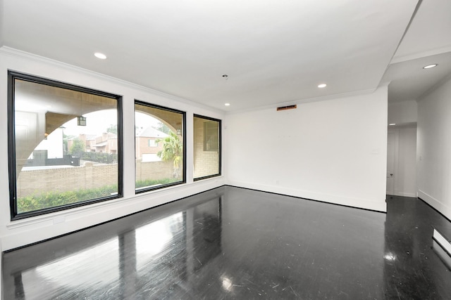 1425 Nantucket Dr Unit G, Houston, TX 77057 - empty room featuring ornamental molding and recessed lighting