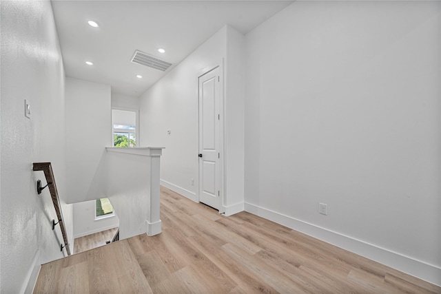 4517 Teton St, Houston, TX 77051 - corridor featuring an upstairs landing, light wood-type flooring, and recessed lighting