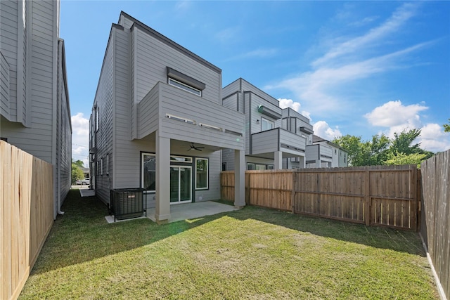 4517 Teton St, Houston, TX 77051 - back of property featuring ceiling fan, a balcony, a patio, and a fenced backyard