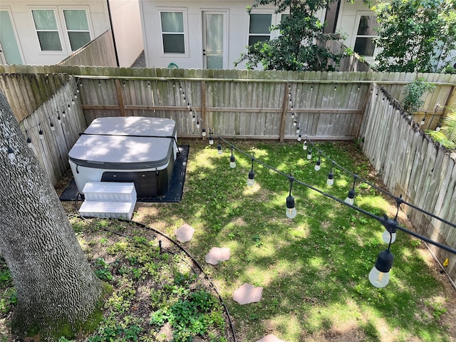 1409 Blair St, Houston, TX 77008 - fenced backyard featuring a hot tub