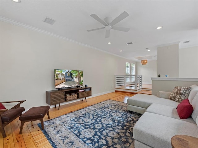 1409 Blair St, Houston, TX 77008 - living room featuring ornamental molding, wood finished floors, ceiling fan, and recessed lighting
