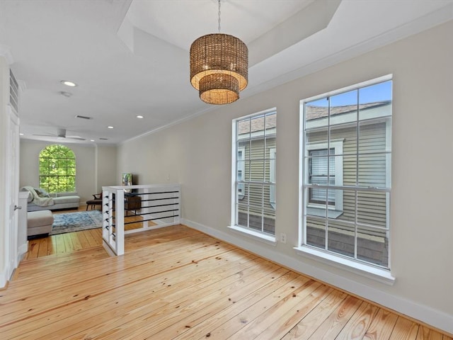1409 Blair St, Houston, TX 77008 - living area featuring a chandelier, wood-type flooring, crown molding, and recessed lighting