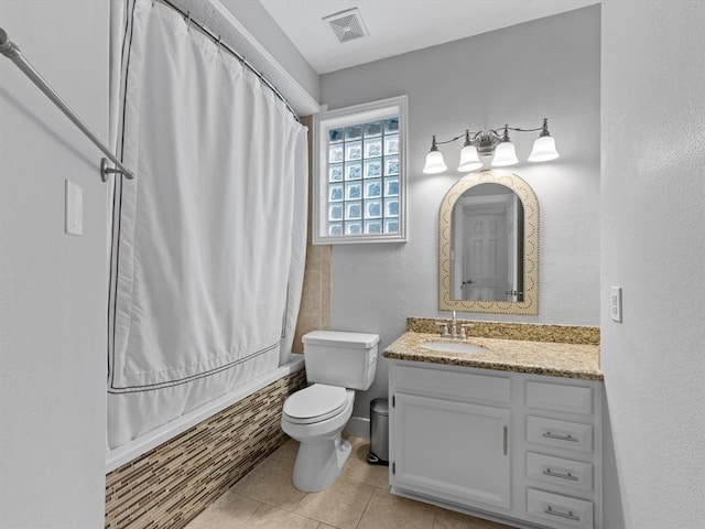 1409 Blair St, Houston, TX 77008 - full bath featuring shower / bathtub combination with curtain, vanity, and tile patterned floors