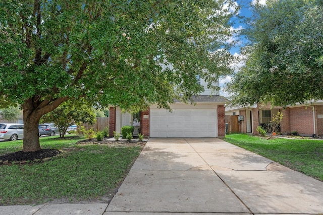 15026 Sunset Creek Dr, Humble, TX 77396 - obstructed view of property with brick siding and driveway