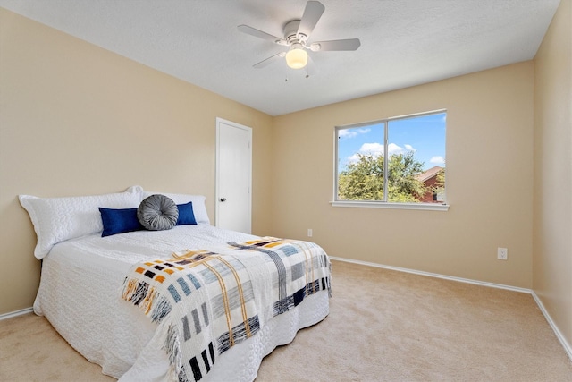 15026 Sunset Creek Dr, Humble, TX 77396 - bedroom featuring light carpet and a ceiling fan