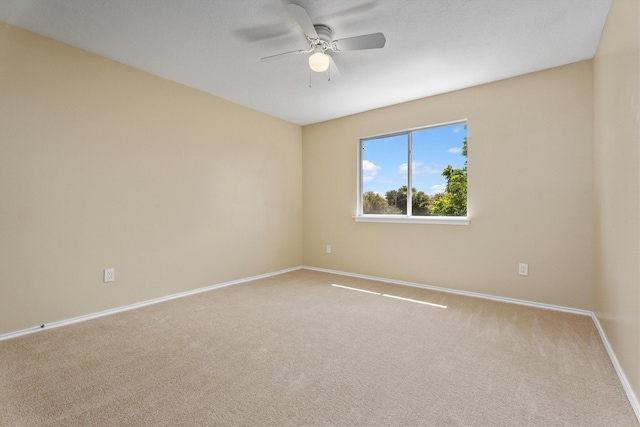 15026 Sunset Creek Dr, Humble, TX 77396 - carpeted spare room featuring a ceiling fan and baseboards