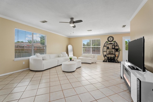 15026 Sunset Creek Dr, Humble, TX 77396 - living area with crown molding, a ceiling fan, and light tile patterned floors