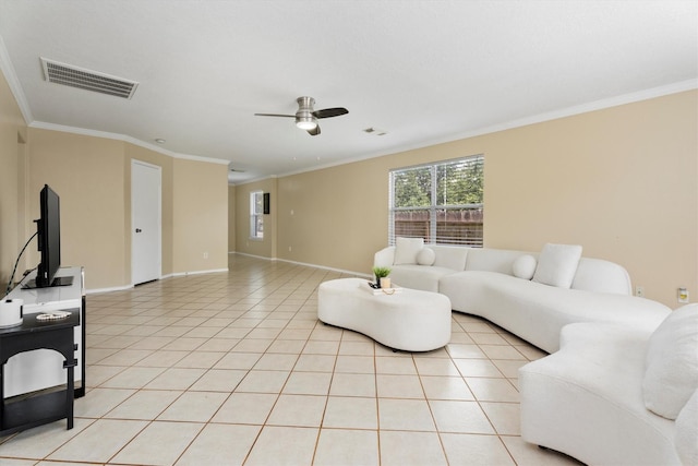 15026 Sunset Creek Dr, Humble, TX 77396 - living room featuring a ceiling fan, crown molding, and light tile patterned flooring