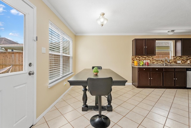 15026 Sunset Creek Dr, Humble, TX 77396 - dining area with crown molding and light tile patterned floors