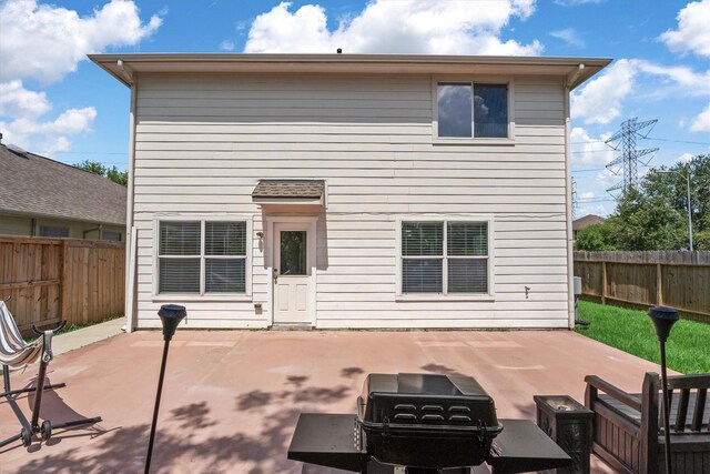 15026 Sunset Creek Dr, Humble, TX 77396 - rear view of house featuring a fenced backyard and a patio