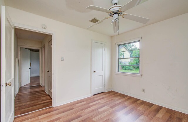 4310 Busiek St, Houston, TX 77022 - empty room featuring light wood-type flooring and a ceiling fan