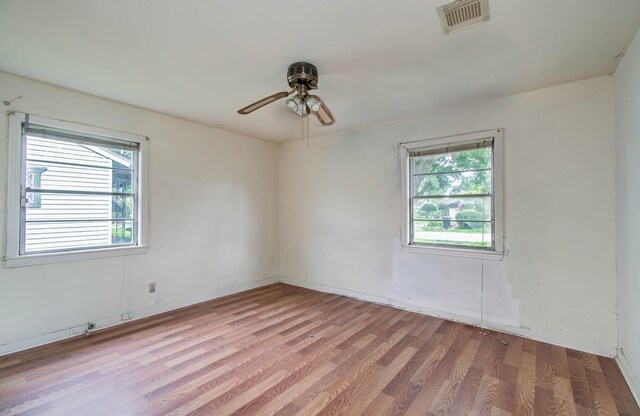 4310 Busiek St, Houston, TX 77022 - empty room featuring light wood finished floors and ceiling fan