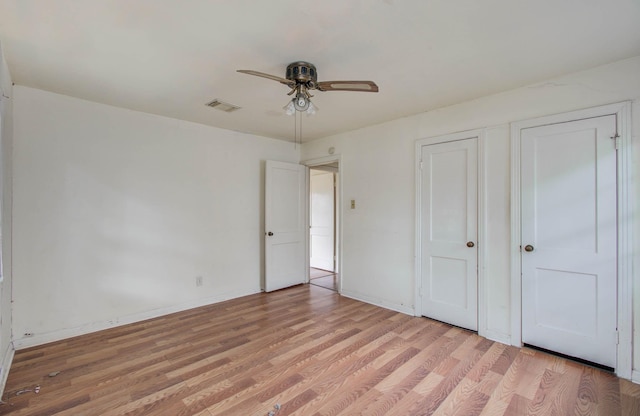 4310 Busiek St, Houston, TX 77022 - unfurnished bedroom with light wood finished floors and a ceiling fan