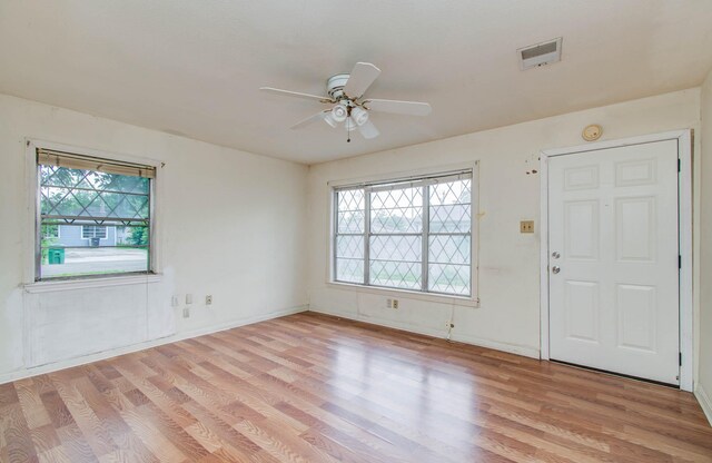 4310 Busiek St, Houston, TX 77022 - foyer entrance with plenty of natural light, light wood-style flooring, and a ceiling fan