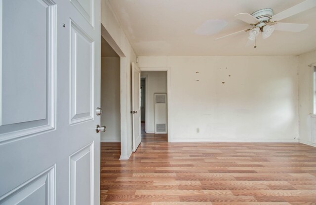 4310 Busiek St, Houston, TX 77022 - empty room featuring light wood-type flooring and ceiling fan
