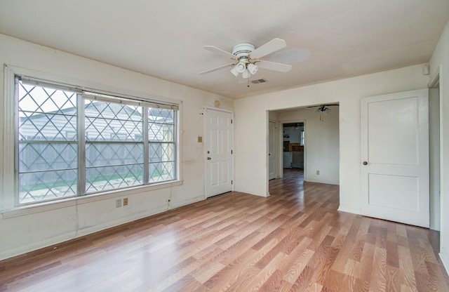 4310 Busiek St, Houston, TX 77022 - unfurnished room featuring light wood-style flooring and ceiling fan