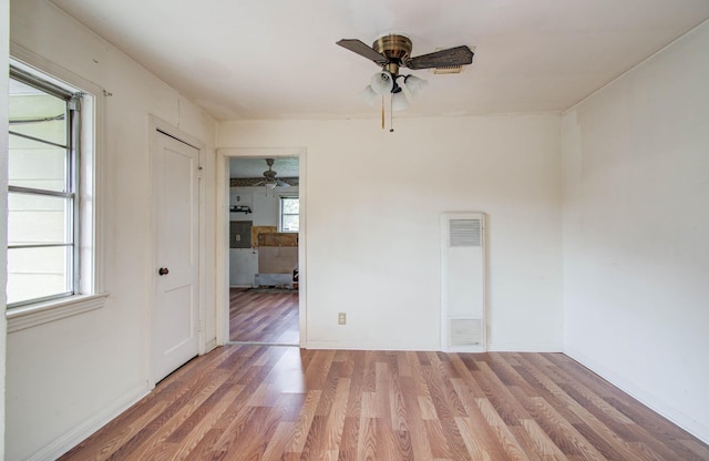 4310 Busiek St, Houston, TX 77022 - spare room with a heating unit, ceiling fan, and light wood finished floors
