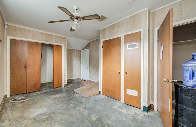 4310 Busiek St, Houston, TX 77022 - unfurnished bedroom with multiple closets, unfinished concrete floors, and ceiling fan