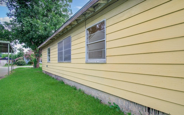 4310 Busiek St, Houston, TX 77022 - view of home's exterior featuring a yard