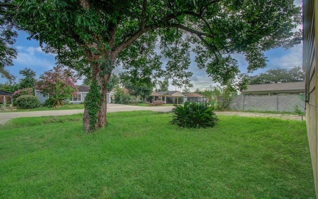 4310 Busiek St, Houston, TX 77022 - view of yard with concrete driveway